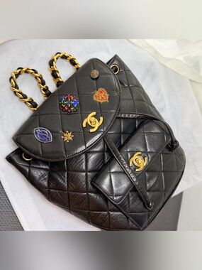 Vintage Chanel duma backpack black gold lambskin charms limited edition